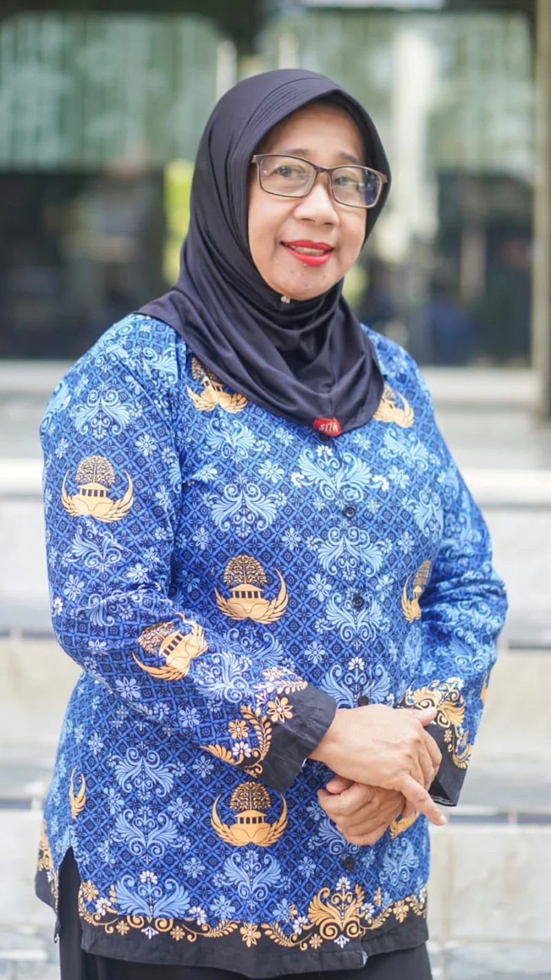 Dra. Hj. Evy Retno Wulandari, M.Pd